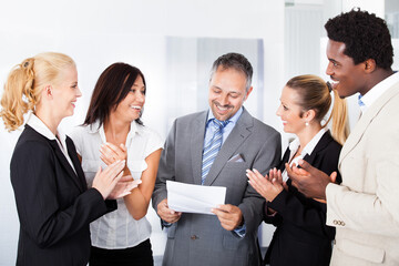 Coworkers-congratulate-Fotolia_55226643_Subscription_Monthly_M-sma