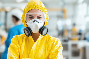 Full-body-hazmat-suit-woman-smiling